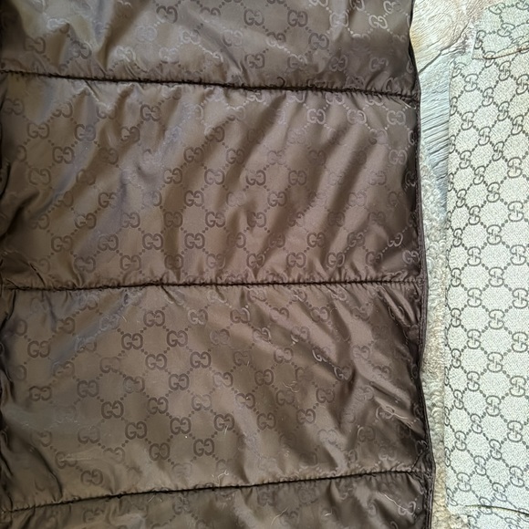 Gucci diaper bag or computer bag.